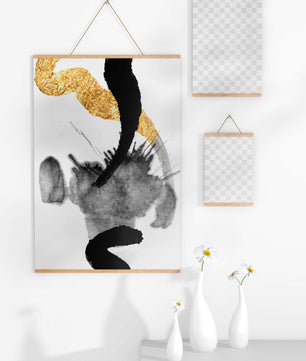Abstract black and gold brushstrokes with textured patterns